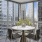 Spacious dining area with floor to ceiling windows 